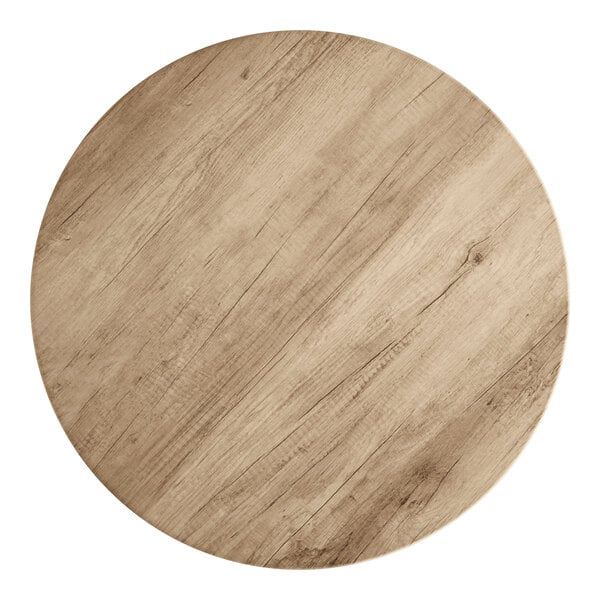 A Lancaster Table & Seating round wood table top with a gray wood finish.