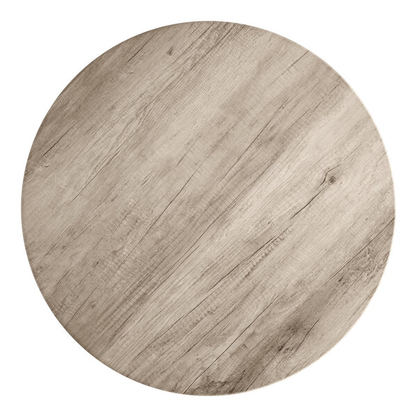 A round, 36-inch thermo-formed MDF table top with a gray wood finish.