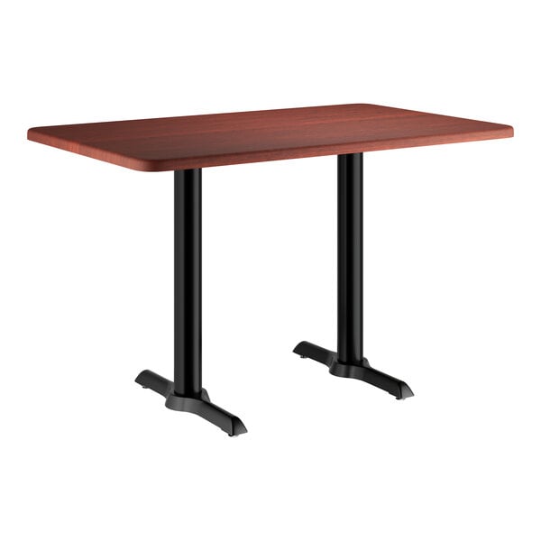 A Lancaster Table & Seating rectangular table with black legs.