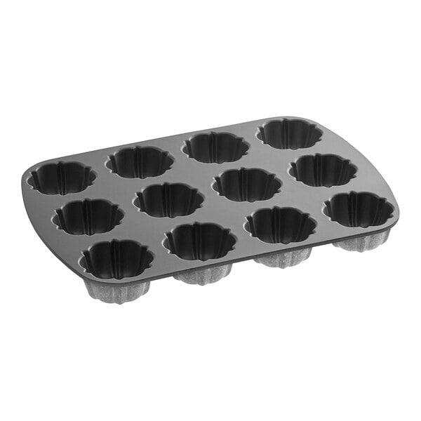 A Nordic Ware Bundtlette cake pan with 12 mini cakes in it.