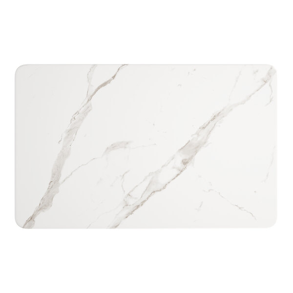 A white rectangular table top with a white marble finish and black veins.