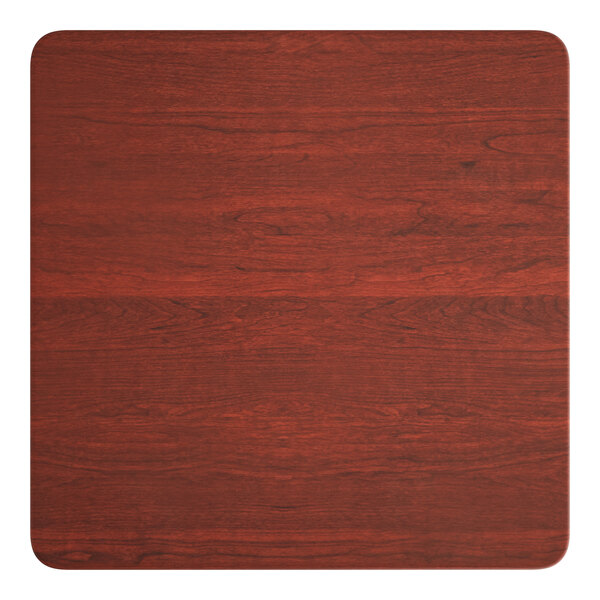 A Lancaster Table & Seating square table top with a red mahogany finish.