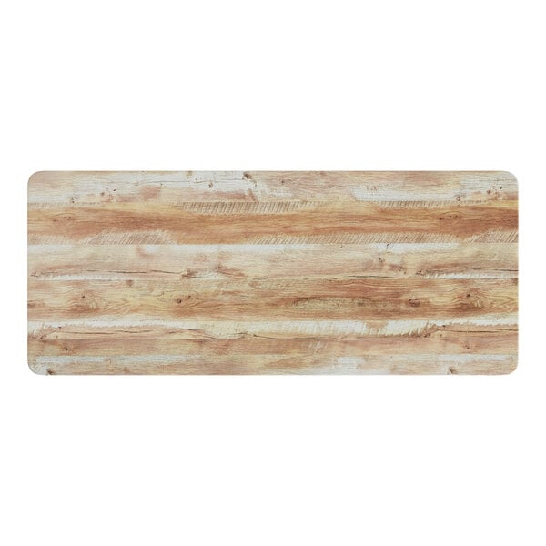 A close-up of a rectangular Lancaster Table & Seating MDF table top with barnwood finish.
