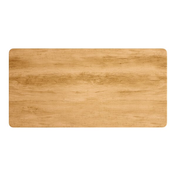 A rectangular wood table top with a maple finish.
