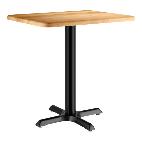 A rectangular wooden table with a black base.