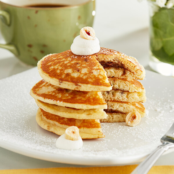 A close up of a White Toque chocolate filled pancake.