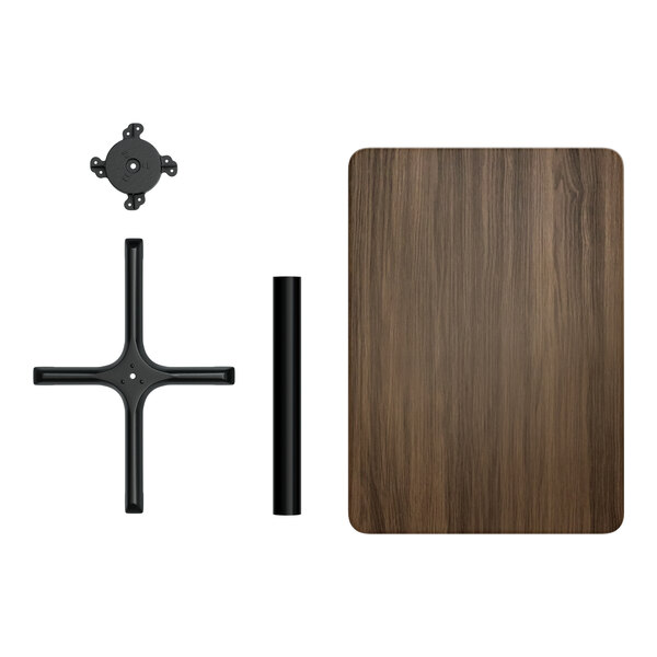 A Lancaster Table & Seating rectangular table with a dark walnut finish and black metal base.