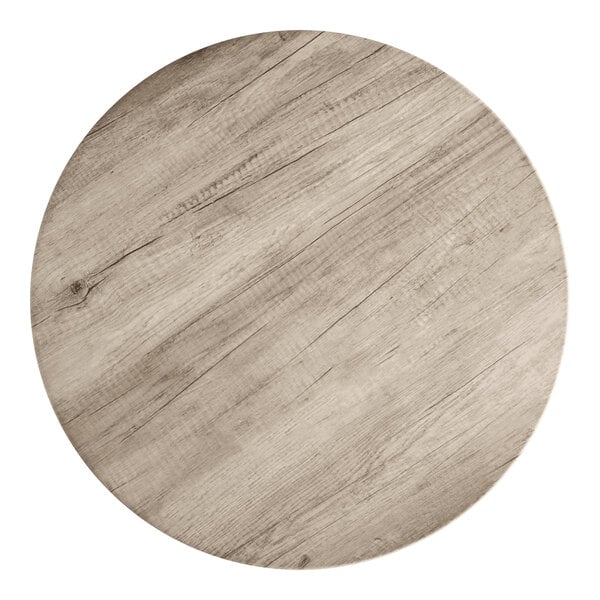 A 30-inch round thermo-formed MDF table top with a gray wood finish.