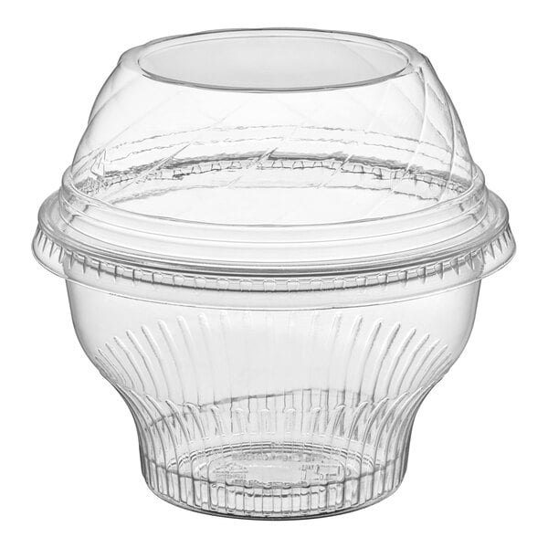 A clear plastic Choice dessert cup with a low dome lid.
