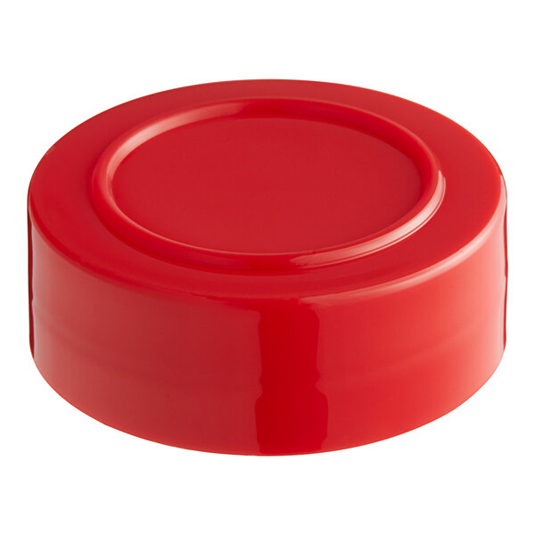 A red lid on a container.