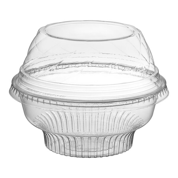 A clear plastic Choice dessert cup with a low dome lid.