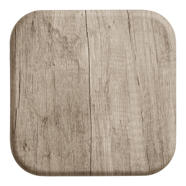 A square MDF table top sample with a gray wood finish and rounded corners.