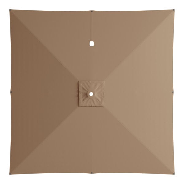 A tan square umbrella canopy with a hole in the center.