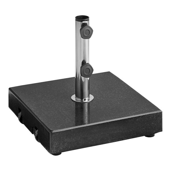 A Lancaster Table & Seating black square granite umbrella base with a metal pole.
