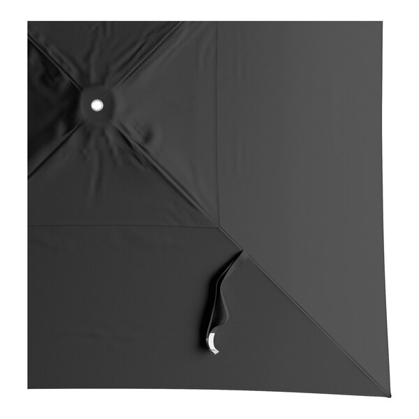 A black umbrella canopy with a hole in the center.