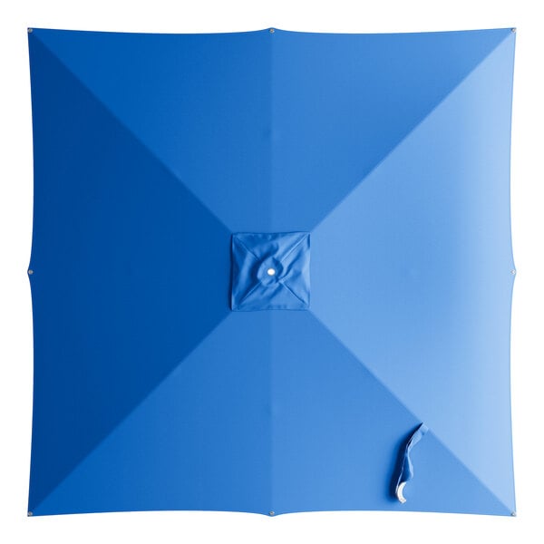 A blue square umbrella canopy with a white circle in the center.