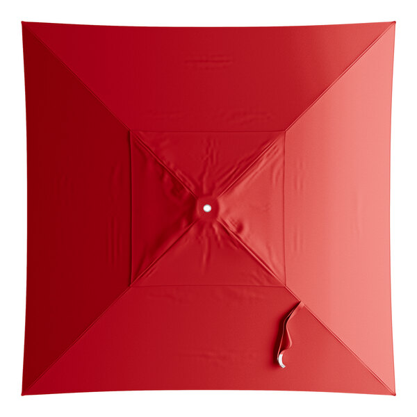 A red square umbrella canopy with a curved edge.