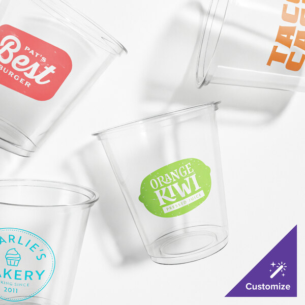 A close up of a Tossware plastic cup with a green label on it.