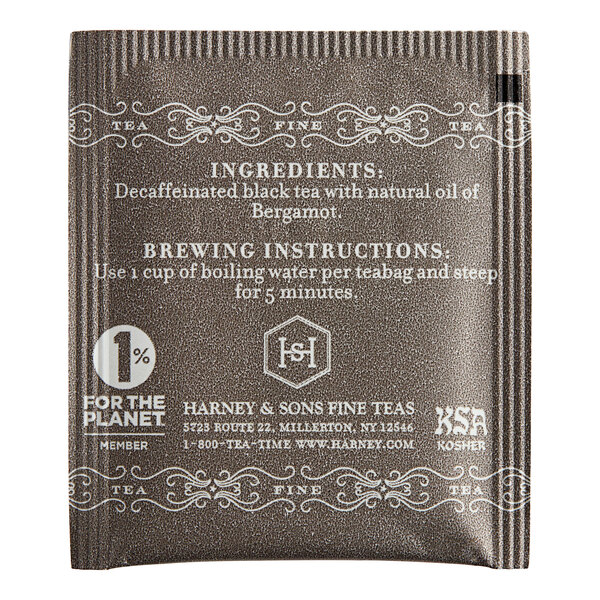 A brown Harney & Sons decaf Earl Grey tea bag packet with white text.
