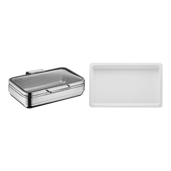 A rectangular silver WMF chafing dish with a lid and white porcelain inserts.