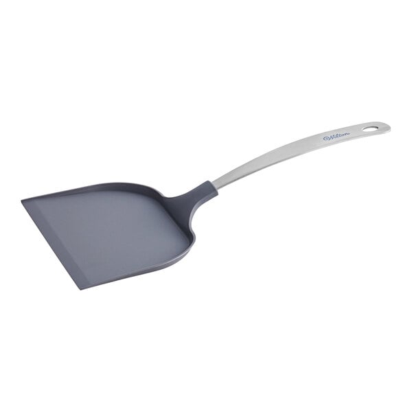 A grey plastic spatula with a long silver handle.