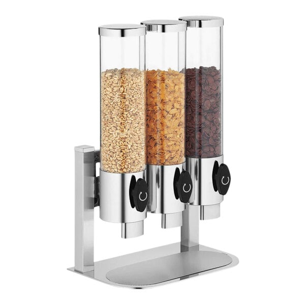 A Hepp by Bauscher stainless steel triple canister cereal dispenser filled with three types of cereal.