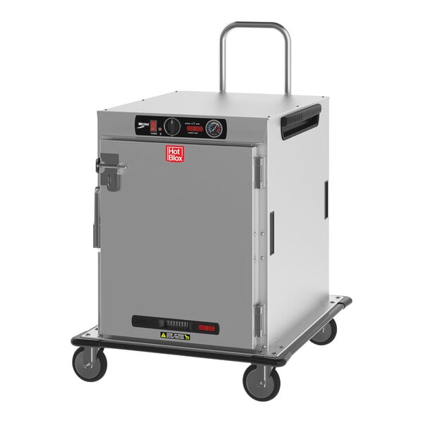 A silver rectangular Metro heated holding cabinet with a solid door.