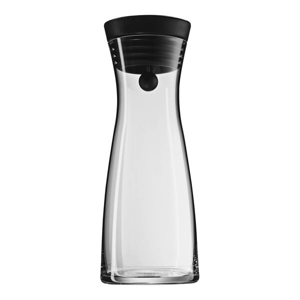 A WMF by BauscherHepp Basic glass carafe with a black lid.