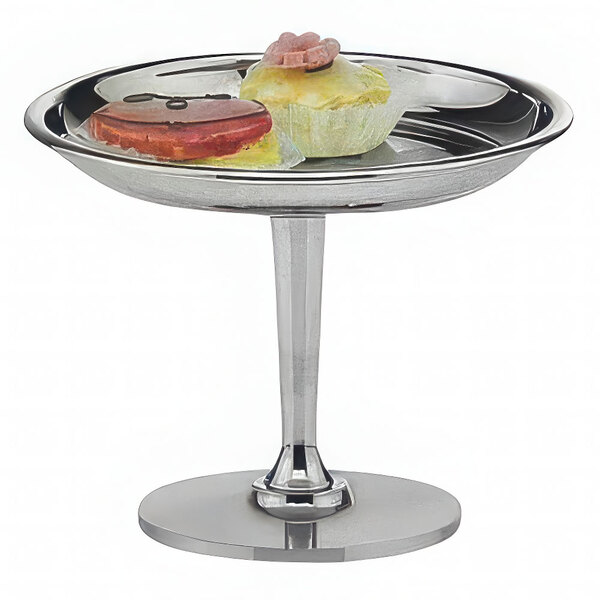 A silver plated stainless steel Hepp Profile pastry stand with food on it.