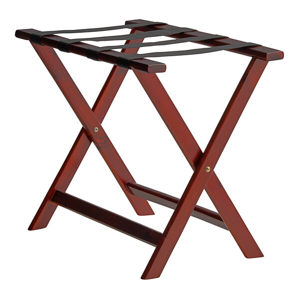 A Lancaster Table & Seating mahogany wood folding luggage rack with two legs.