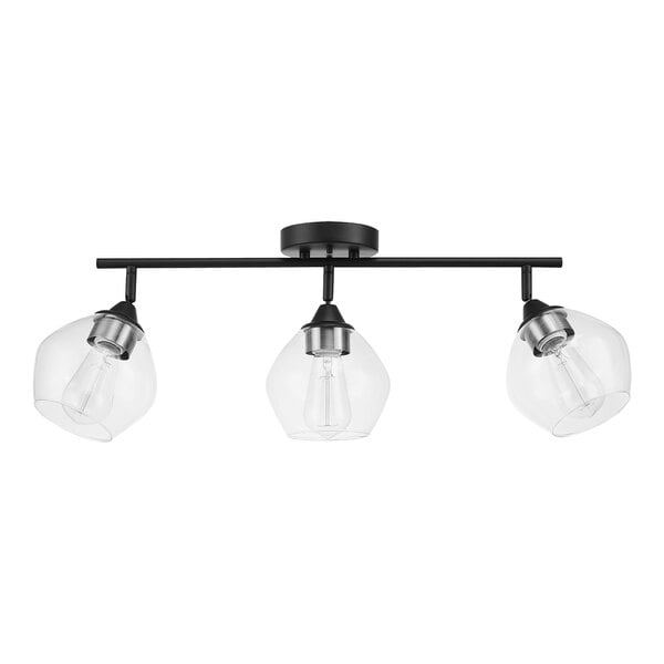 A Globe matte black island light with three clear glass shades.