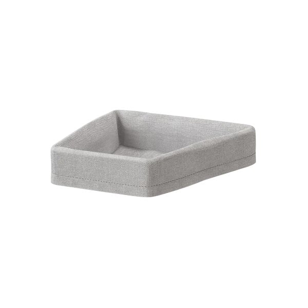 A grey rectangular fabric bread basket on a table.