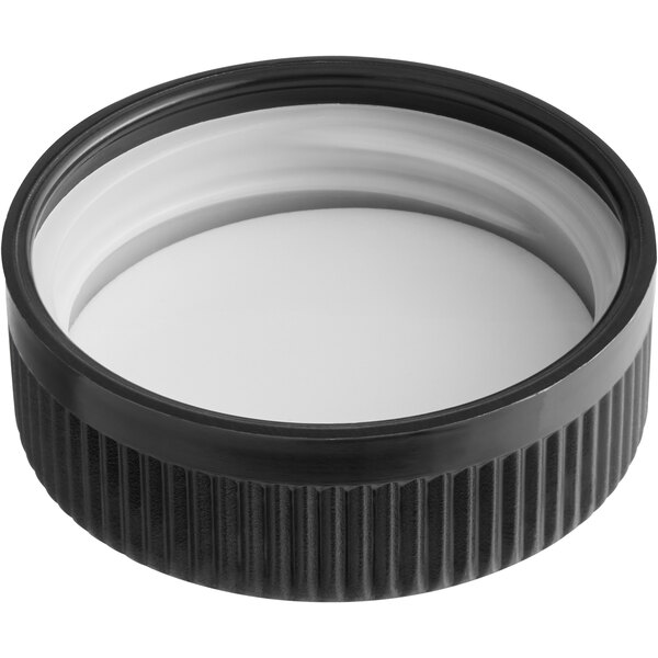 A black plastic child resistant cap with foam liner and instruction text.