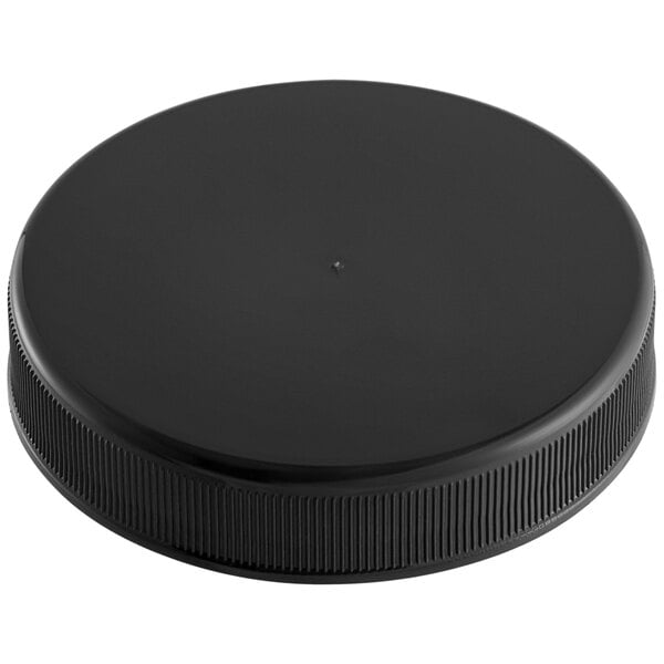A 53/400 black plastic cap with a foam liner.