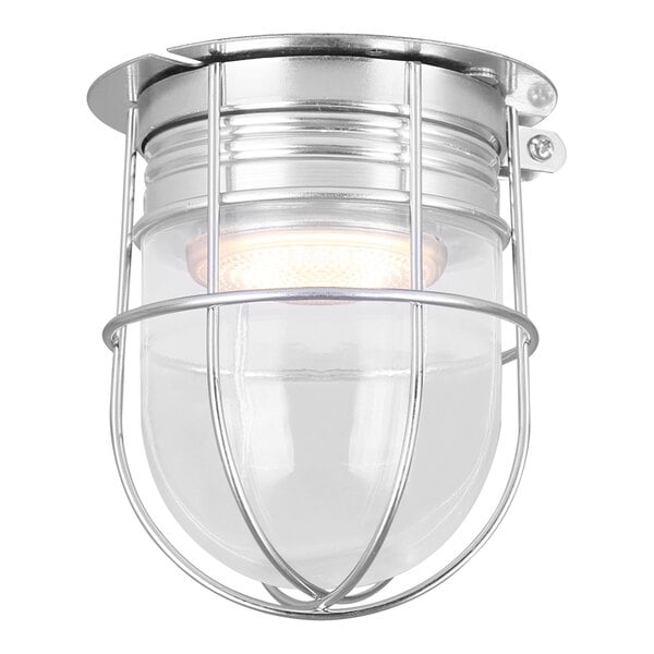 A Canarm chrome outdoor light fixture with a clear glass shade.