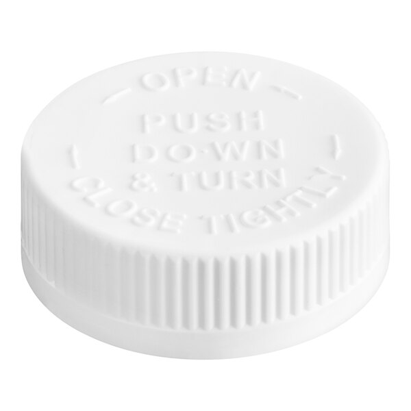 A white plastic 45/400 child resistant cap with text reading "push down and turn".