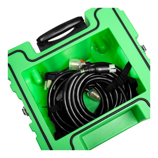 A green box with black cables inside it.