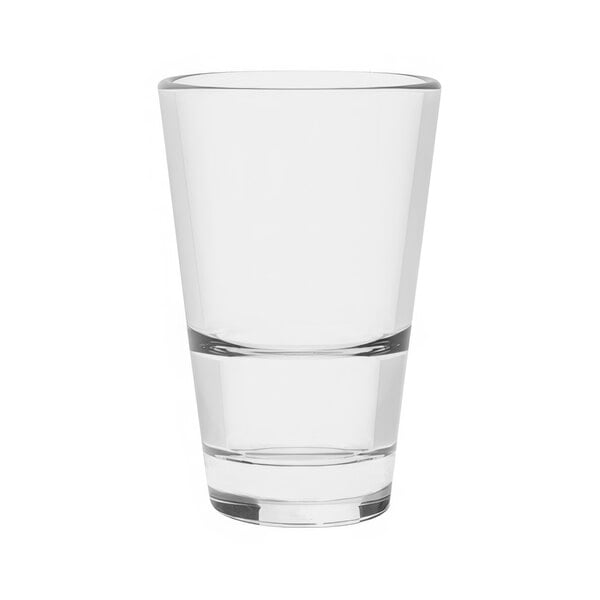 A Tossware Reserve Tritan plastic shot glass filled with liquid on a white background.