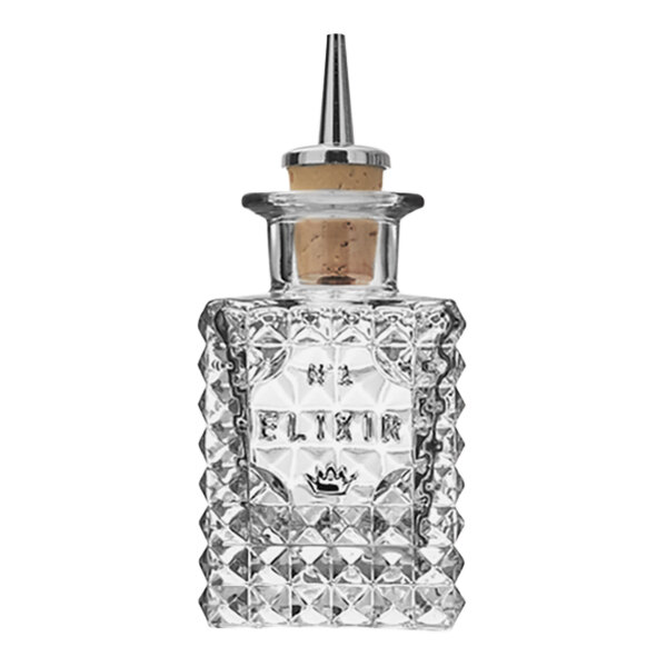 A Luigi Bormioli cut glass bitters bottle with a cork stopper.