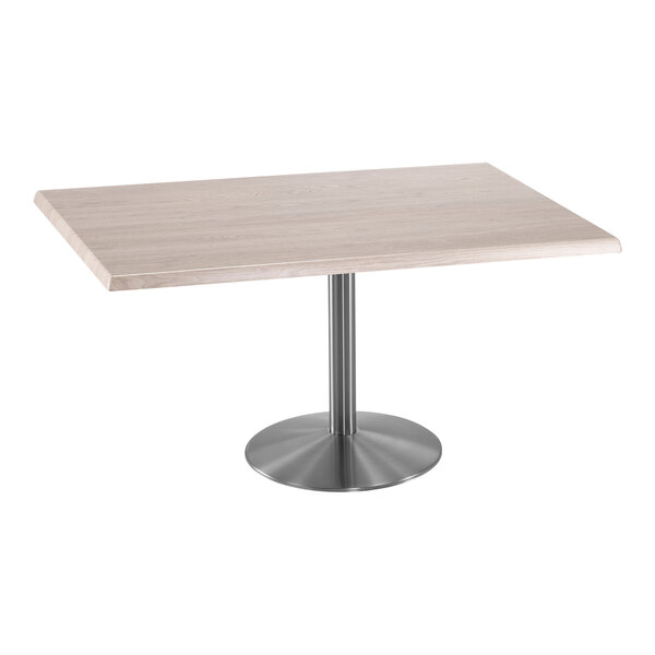 A rectangular Holland Bar Stool table with a stainless steel base and white ash top.