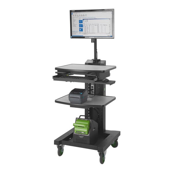 A Newcastle Systems NB Series sit/stand mobile workstation with a computer monitor and keyboard on it.