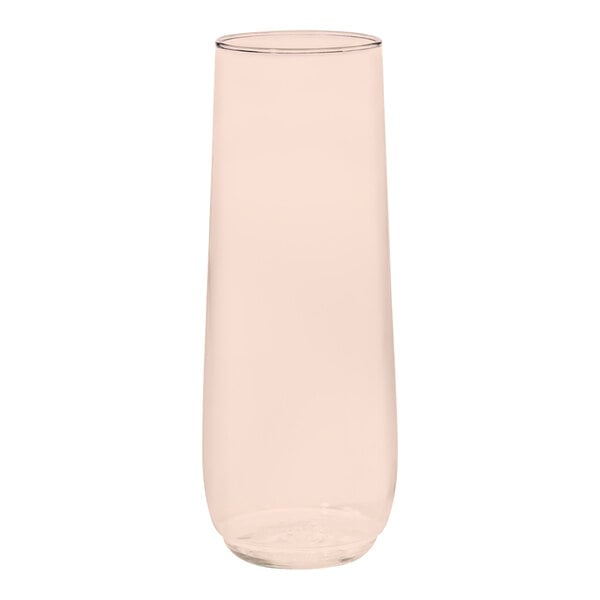 A clear Tossware POP coral pink flute glass.