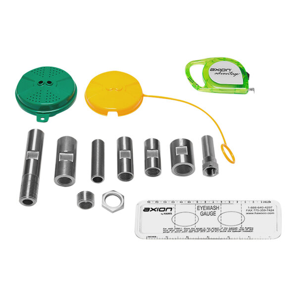 A green and yellow Haws Axion Advantage upgrade kit with metal parts and a green screwdriver.