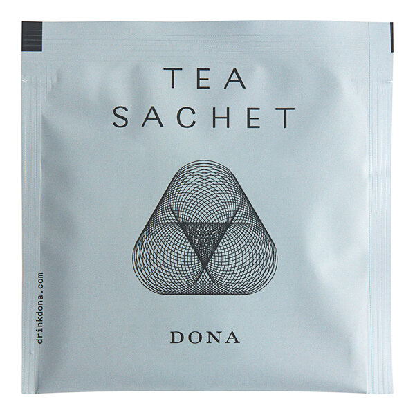 A white Dona tea sachet packet with a black triangle logo.