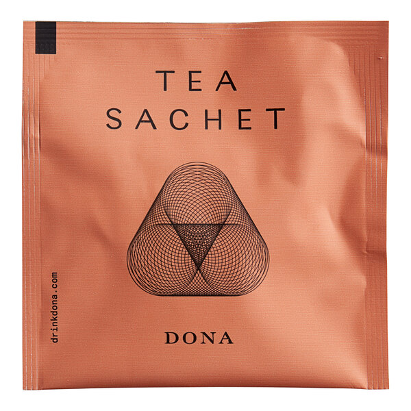 A white Dona Flirt tea sachet box with a black triangle in the center.