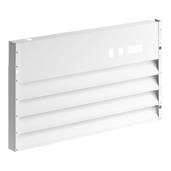 A white rectangular front grille with four panels and holes.