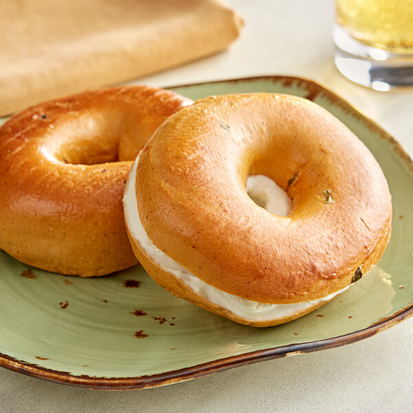 Two Just Bagels jalapeno bagels on a plate.