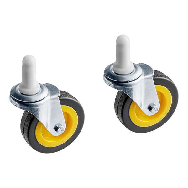 A pair of yellow and black Lavex front wheel casters with yellow rubber wheels.
