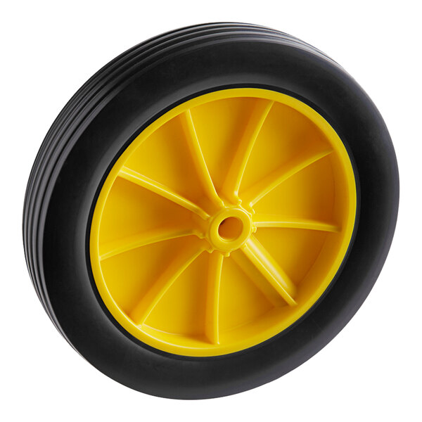 A close up of a yellow wheel with black spokes.