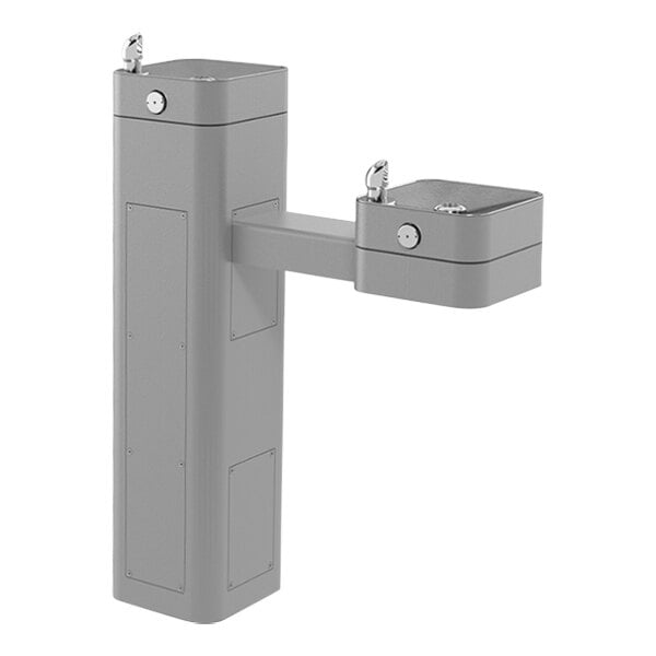 A gray Haws outdoor pedestal drinking fountain with two faucets.